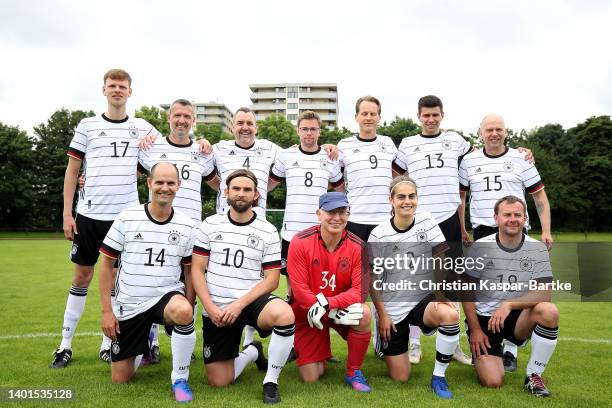 The team lines up ahead of a fan match prior to the UEFA Nations League match between Germany and England at Allianz Arena on June 07, 2022 in...