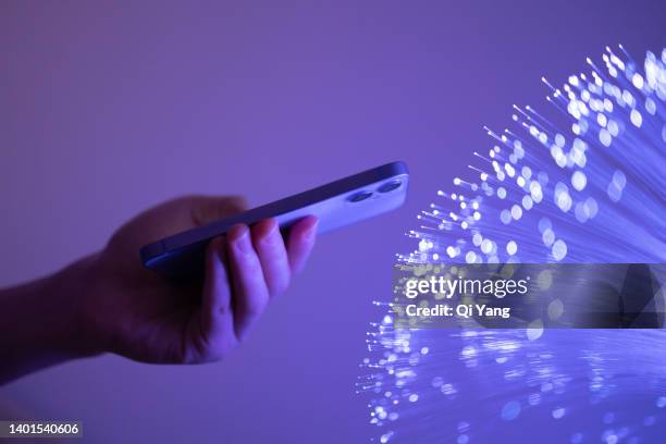smartphone with fiber optic connection - bar code bildbanksfoton och bilder