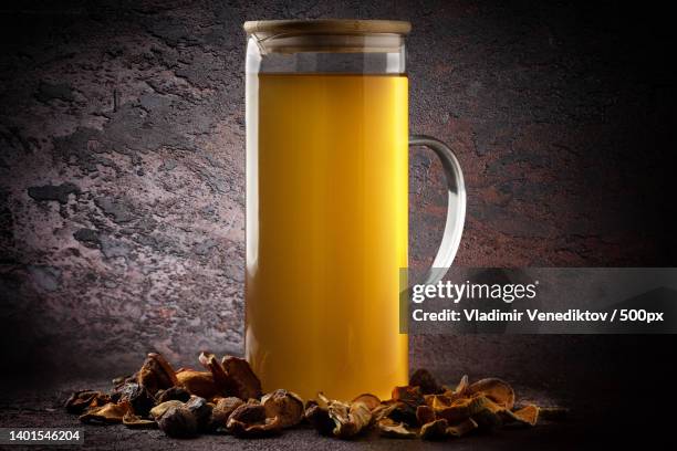 compote of dried fruits in the jug - dried plum stock pictures, royalty-free photos & images