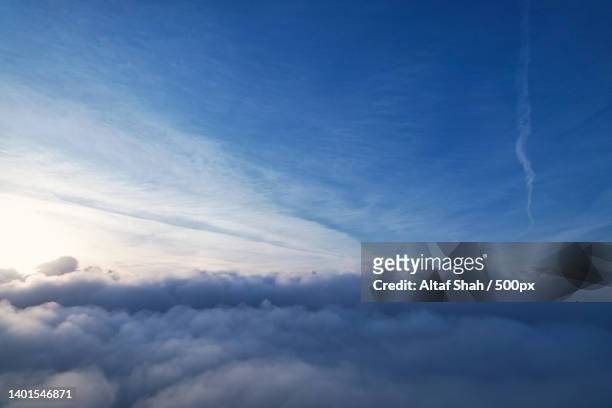 best sunrise view from above the think moving clouds over luton town of england,luton,united kingdom,uk - 空のみ ストックフォトと画像