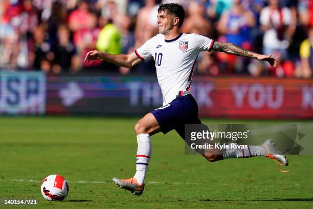 Christian Pulisic of the United States pushes the ball into the Uruguay backfield during the second half of the friendly match at Children's Mercy...