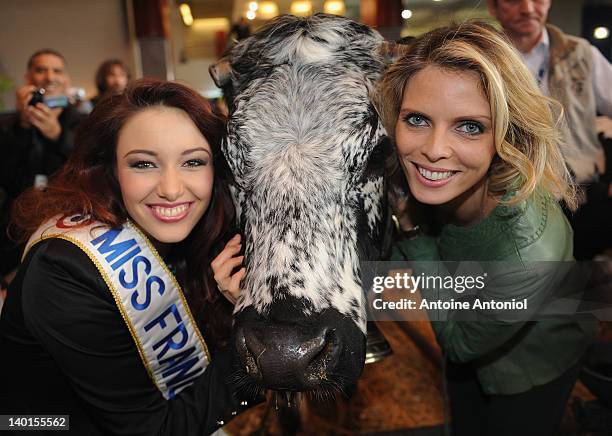 Delphine Wespiser , Miss France 2012, and Sylvie Tellier , Miss France 2002 and general director of Miss france, visit the Salon de l'Agriculture at...