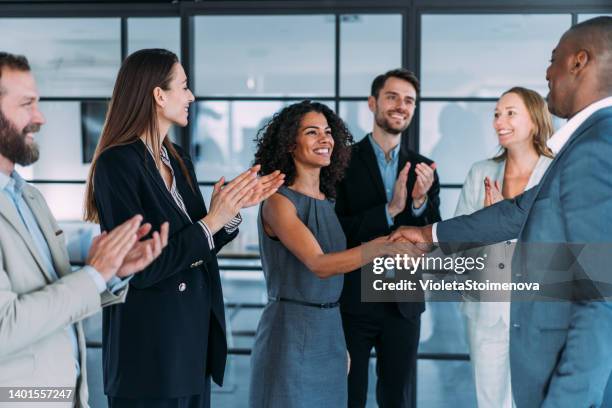 successful partnership - business partnership handshake stock pictures, royalty-free photos & images