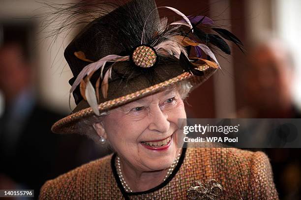 Queen Elizabeth II smiles as she opens the refurbished East Wing of Somerset House, on February 29, 2011 in London, England.