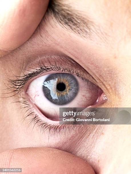 human eye, wide and fixed, skin - optical equipment stock pictures, royalty-free photos & images