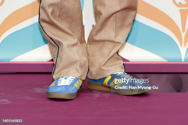 Jay B, shoe detail, of Boy band GOT7 attends the 'GUCCI X adidas' collaboration photocall on June 07, 2022 in Seoul, South Korea.