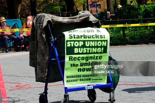 Amazon and Starbucks stop Union Busting sign, International Workers Day, United Against Union Busting March and Rally, Workers Circle, Amazon Labor...