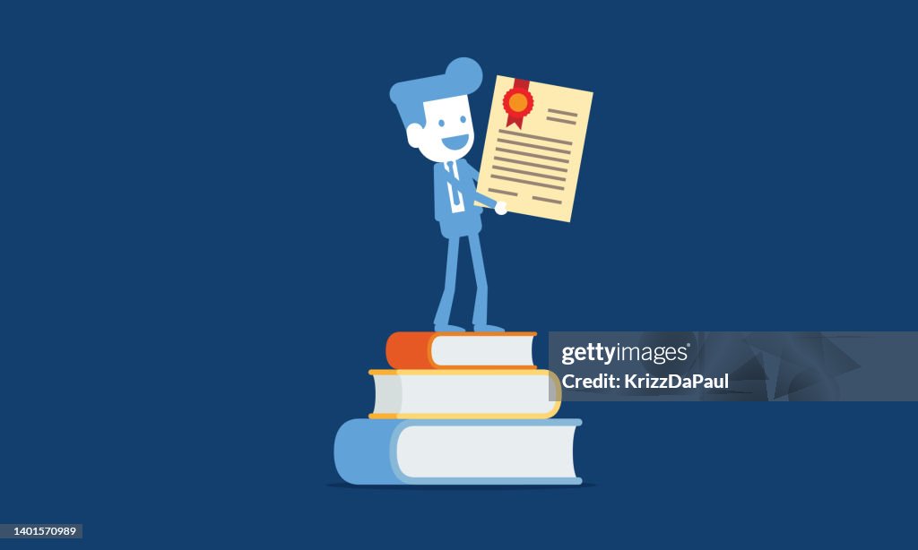 Successful businessman standing on stack of books