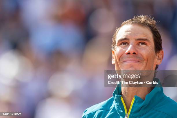 Rafael Nadal of Spain reacts to the response of the spectators after receiving the winners trophy after his victory against Casper Rudd of Norway...