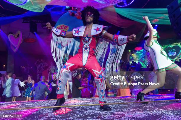 Two dancers at the Flower Power party at Pacha Ibiza nightclub, on June 7 in Ibiza, Balearic Islands, Spain. The Flower Power party has been held at...