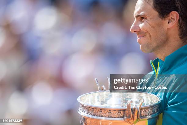 Rafael Nadal of Spain with the winners trophy after his victory against Casper Rudd of Norway during the Singles Final for Men on Court Philippe...