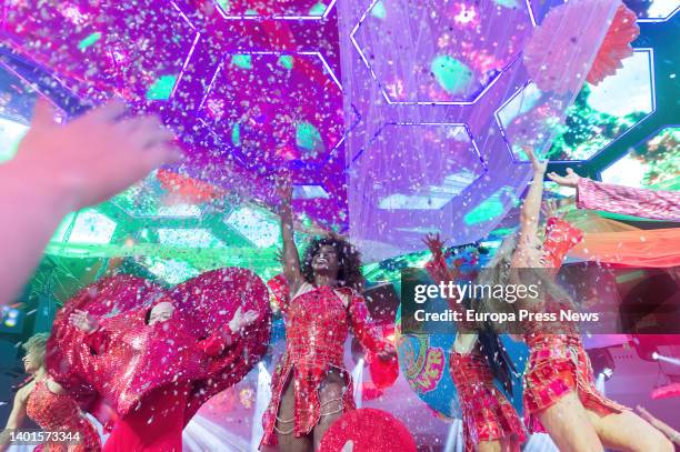 Three people animate the Flower Power party with confetti, at the Pacha Ibiza nightclub, on June 7 in Ibiza, Balearic Islands, Spain. The Flower...