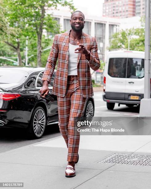 Dwyane Wade is seen wearing a Burberry suit and Duke Dexter shoes on the Upper West Side on June 07, 2022 in New York City.