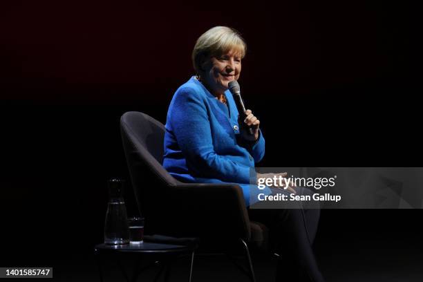 Former German Chancellor Angela Merkel sits down for a conversation with journalist Alexander Osang on stage at the Berliner Ensemble theatre on June...