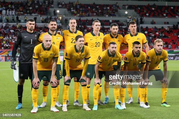 Australia players pose for a team photo prior to the 2022 FIFA World Cup Playoff match between United Arab Emirates and Australia at Ahmad Bin Ali...