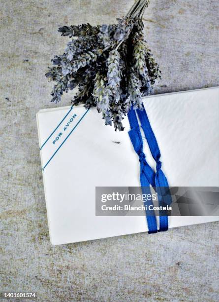 old love letters with dried lavender flowers - blue envelope stock pictures, royalty-free photos & images