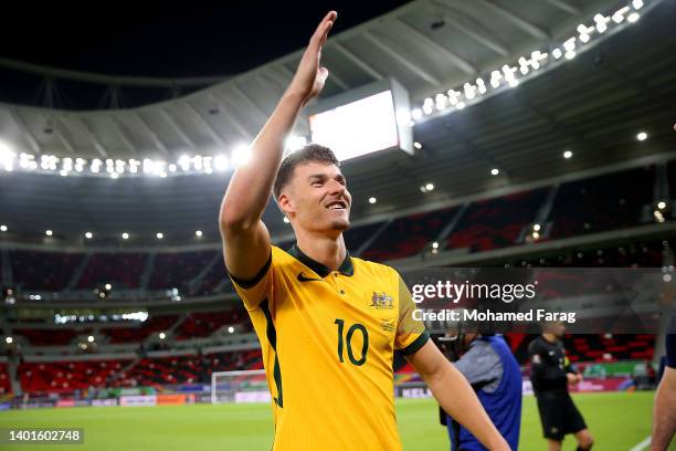 Ajdin Hrustic of Australia celebrates after their sides victory during the 2022 FIFA World Cup Playoff match between United Arab Emirates and...