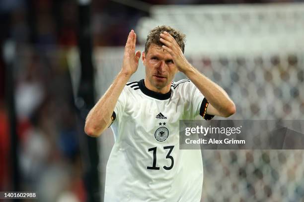 Thomas Mueller of Germany applauds the fans as they are substituted during the UEFA Nations League League A Group 3 match between Germany and England...