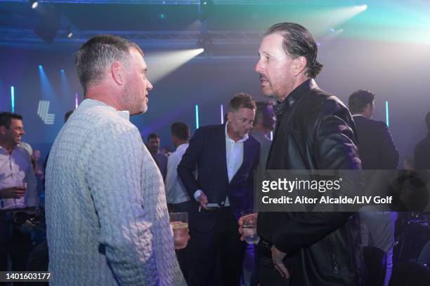 Phil Mickelson of the United States talks to Lee Westwood of England during the LIV Golf Invitational - London Draft on June 07, 2022 in London,...