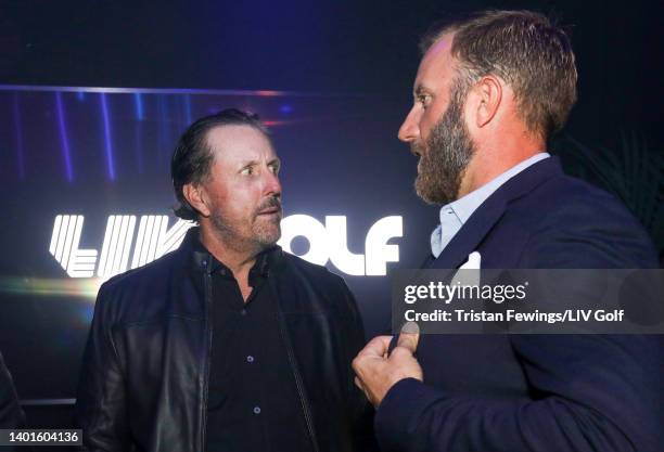 Phil Mickelson and Dustin Johnson of the United States talk during the LIV Golf Invitational - London Draft on June 07, 2022 in London, England.
