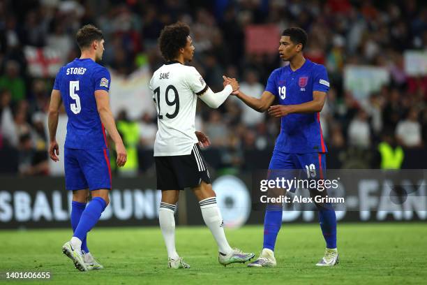 Leroy Sane of Germany embraces Jude Bellingham of England after the UEFA Nations League League A Group 3 match between Germany and England at Allianz...