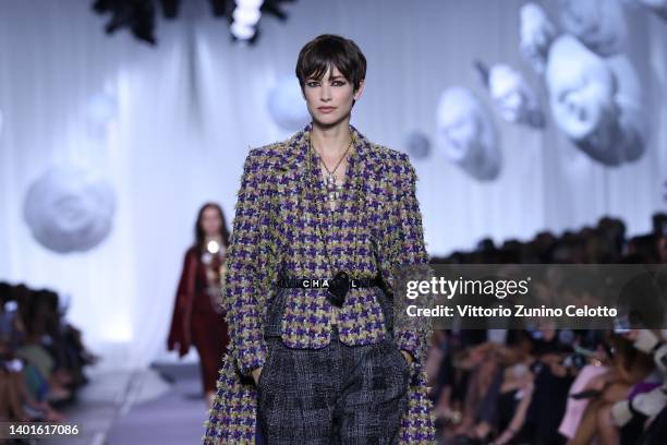 Model walks the runway at the Chanel Metiers D'Art Fashion Show on June 07, 2022 in Florence, Italy.