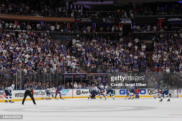 The New York Rangers face-off against the Tampa Bay Lightning in Game Two of the Eastern Conference Final of the 2022 Stanley Cup Playoffs at Madison...