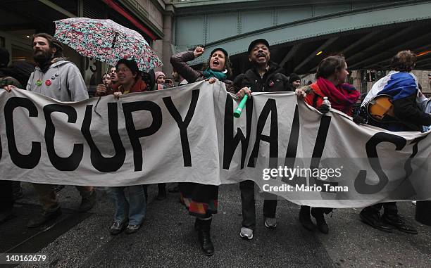 Protesters demonstrate during an Occupy Wall Street "Shut Down the Corporations" protest on February 29, 2012 in New York City. Occupy movements...