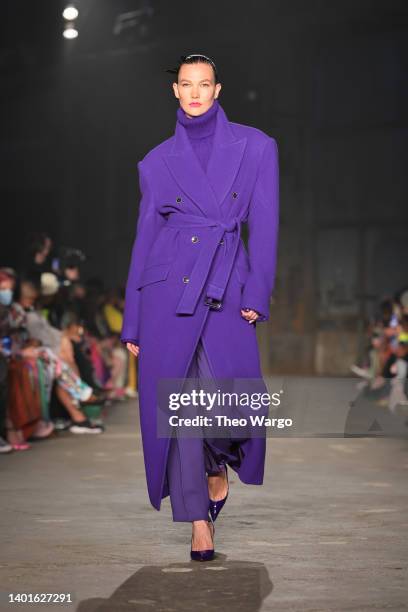 Karlie Kloss walks the runway for the Christopher John Rogers Collection 010 runway show at Brooklyn Navy Yard on June 07, 2022 in Brooklyn, New York.