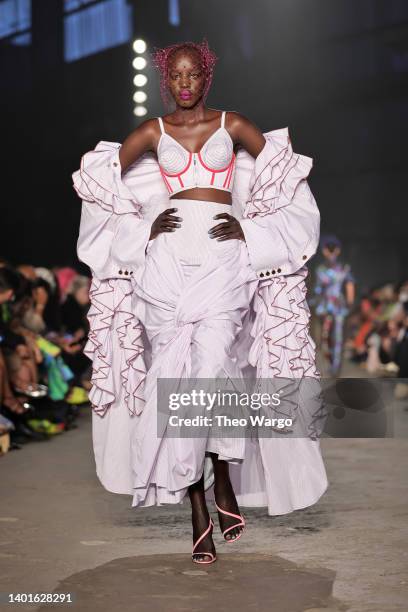 Model walks the runway for the Christopher John Rogers Collection 010 runway show at Brooklyn Navy Yard on June 07, 2022 in Brooklyn, New York.