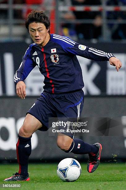 Tadanari Lee of Japan controls the ball during the 2014 FIFA World Cup Brazil Asian 3rd Qualifier match between Japan and Uzbekistan at Toyota...