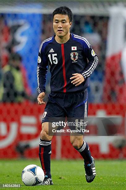 Yasuyuki Konno of Japan controls the ball during the 2014 FIFA World Cup Brazil Asian 3rd Qualifier match between Japan and Uzbekistan at Toyota...