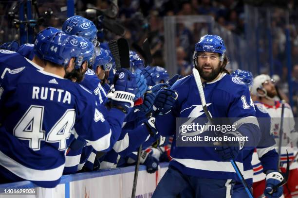 Pat Maroon of the Tampa Bay Lightning celebrates with his teammates after scoring a goal on Igor Shesterkin of the New York Rangers during the first...