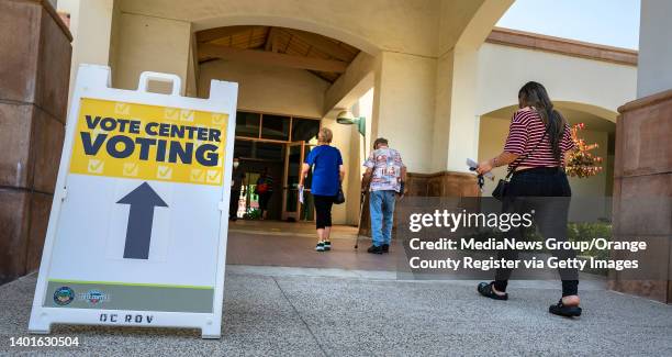 Voters make their way into the Clifton C. Miller Community Center in Tustin to vote in the California primary election, on Tuesday, June 7, 2022.