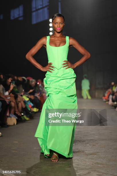 Model walks the runway for the Christopher John Rogers Collection 010 runway show at Brooklyn Navy Yard on June 07, 2022 in Brooklyn, New York.