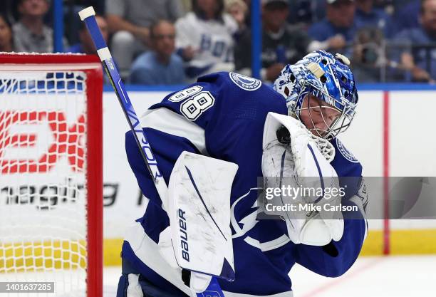 Andrei Vasilevskiy of the Tampa Bay Lightning makes a glove save against the New York Rangers during the second period in Game Four of the Eastern...