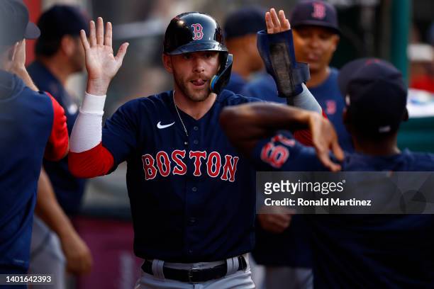 Trevor Story of the Boston Red Sox celebrates a run against the Los Angeles Angels in the second inning at Angel Stadium of Anaheim on June 07, 2022...