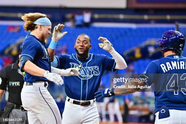 Taylor Walls of the Tampa Bay Rays scores after hitting a three-run walk-off home run in the 10th inning to defeat the St. Louis Cardinals 4- at...