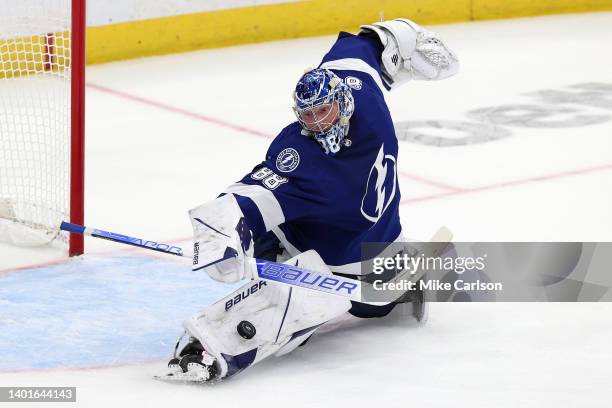 Andrei Vasilevskiy of the Tampa Bay Lightning makes a kick save against the New York Rangers during the third period in Game Four of the Eastern...