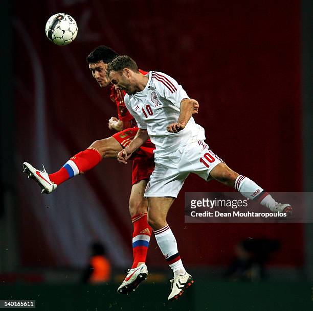 Dennis Rommedahl of Denmark and Yuriy Zhirkov of Russia battle for the ball during the International Friendly between Denmark and Russia at Parken...