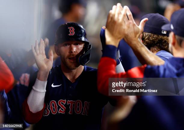 Trevor Story of the Boston Red Sox celebrates a run against the Los Angeles Angels in the tenth inning at Angel Stadium of Anaheim on June 07, 2022...