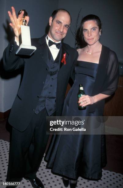 Kate Tucci and Stanley Tucci with an award at the 56th Annual Golden Globe Awards, Beverly Hills.