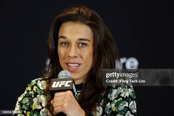 Joanna Jedrzejczyk of Poland fields questions from the media ahead of her strawweight bout against Zhang Weili of China during UFC 275 Media Day at...