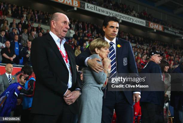 Parents of the late Gary Speed, Roger and Carol Speed are seen with Wales manager Chris Coleman during the Gary Speed Memorial International Match...