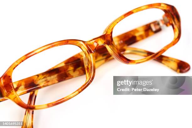 spectacles close up - tortoiseshell pattern stockfoto's en -beelden