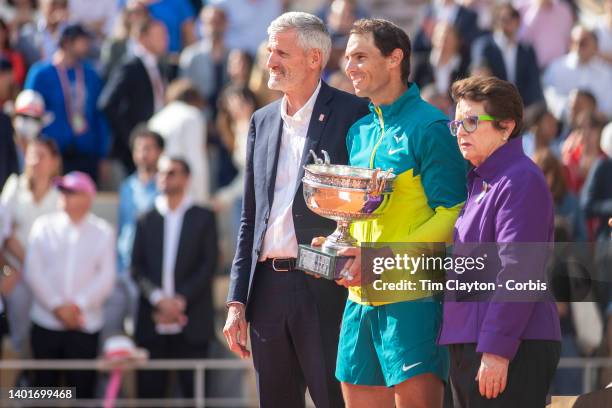 Rafael Nadal of Spain with the winners trophy with French Tennis Federation President Gilles Moretton and Billie Jean King at the presentation...