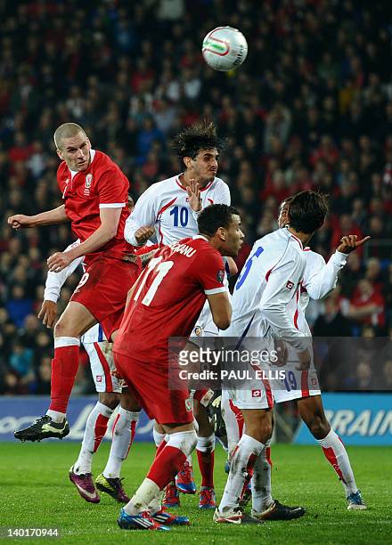 Wales' Steve Morison heads towards goal during the Gary Speed Memorial Match, a friendly international football match between Wales and Costa Rica at...