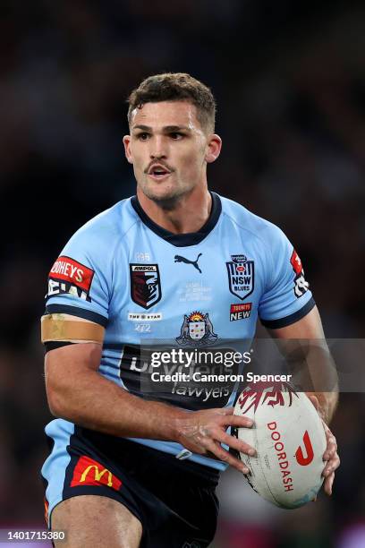 Nathan Cleary of the Blues runs the ball during game one of the 2022 State of Origin series between the New South Wales Blues and the Queensland...