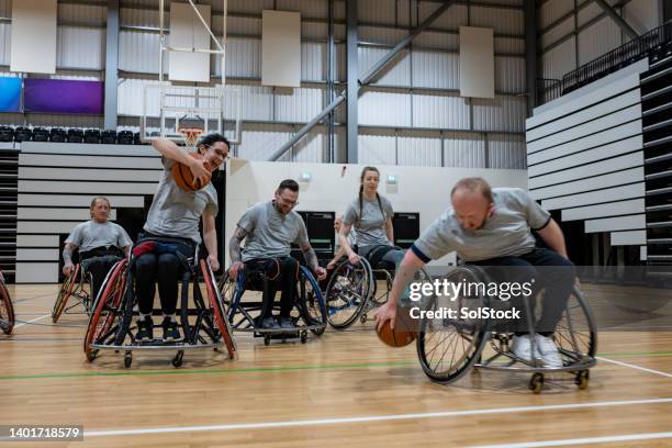 playing games at basketball practise - hoop rolling stock pictures, royalty-free photos & images