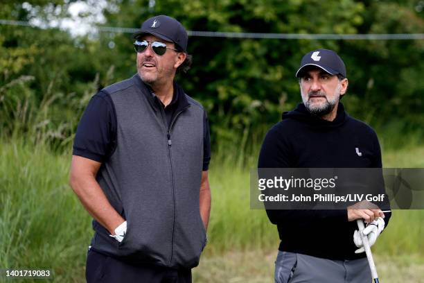 Phil Mickelson of the United States talks to His Excellency Yasir Al-Rumayyan during the Pro-Am ahead of the LIV Golf Invitational at The Centurion...